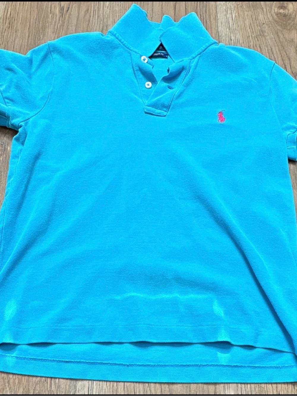Ralph Lauren woman’s Polo in Bright Turquoise with Pink Logo
